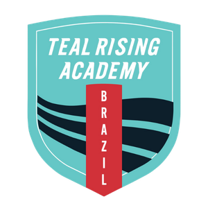 Teal Rising Academy Brazil crest